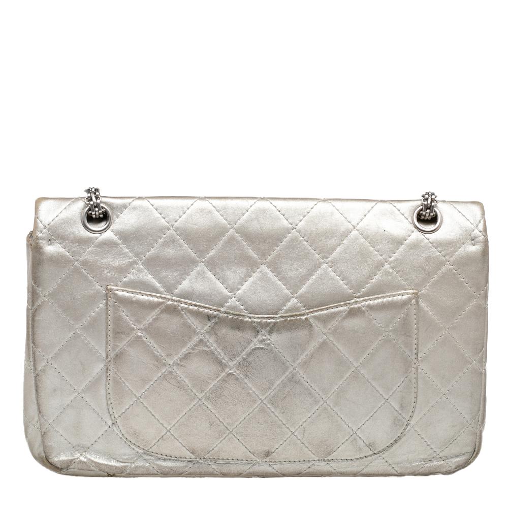 Introduce Chanel's irreplaceable style to your closet with this Reissue 2.55 Classic 227 flap bag. Crafted using leather, the silver bag has a signature quilted exterior, the Mademoiselle lock on the front, and a leather-lined interior. Complete