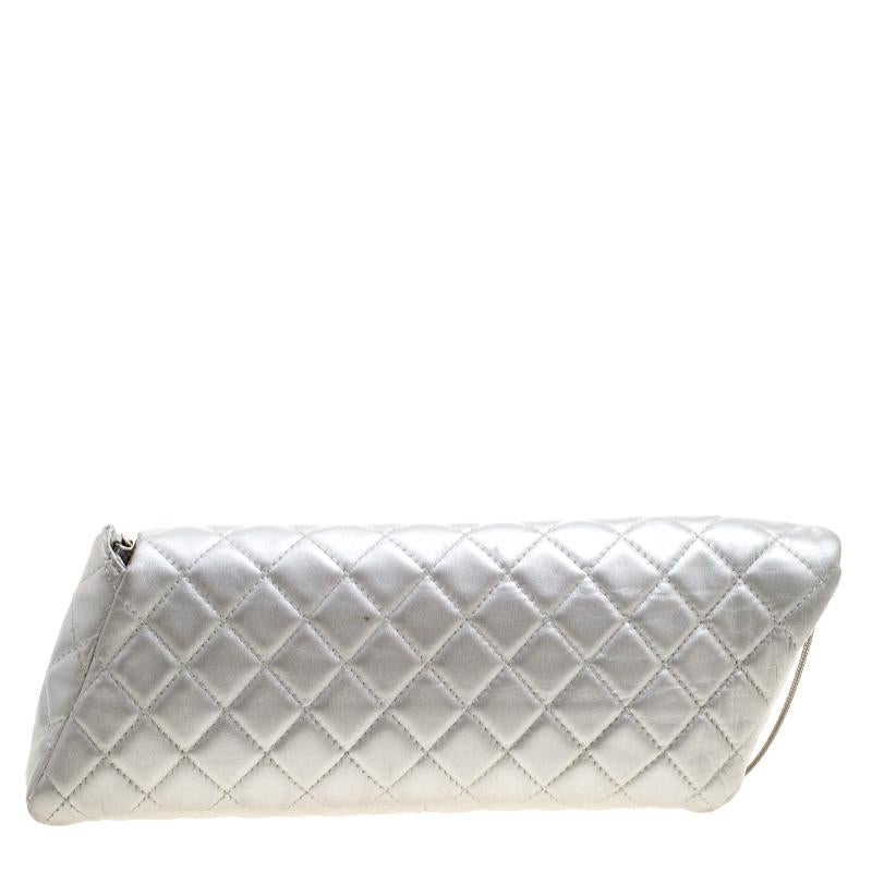 Crafted with precision from leather, and touched with a silver shade, this Reissue chain clutch from Chanel cannot get any luxurious than it already is! This piece comes in a slanting shape, and as is the design with almost all the Reissue pieces,