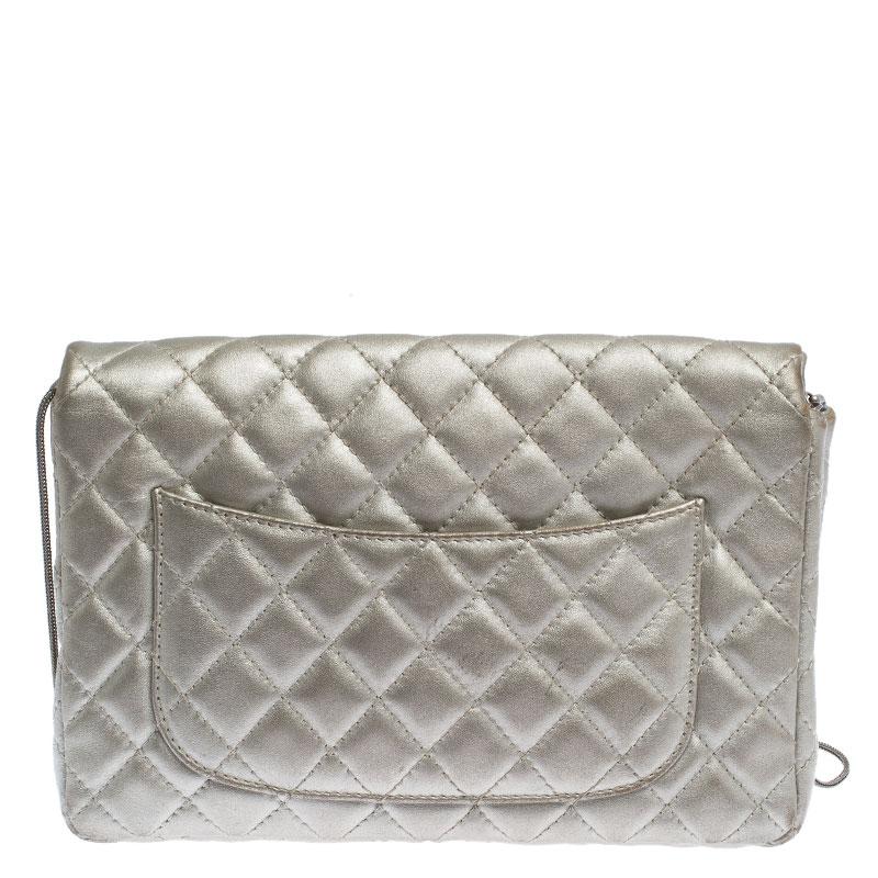 Chanel's Flap Bags are iconic and noteworthy in the history of fashion. Hence, this Reissue is a buy that is worth every bit of your splurge. Exquisitely crafted from silver leather, it bears their signature quilt pattern and the iconic Mademoiselle