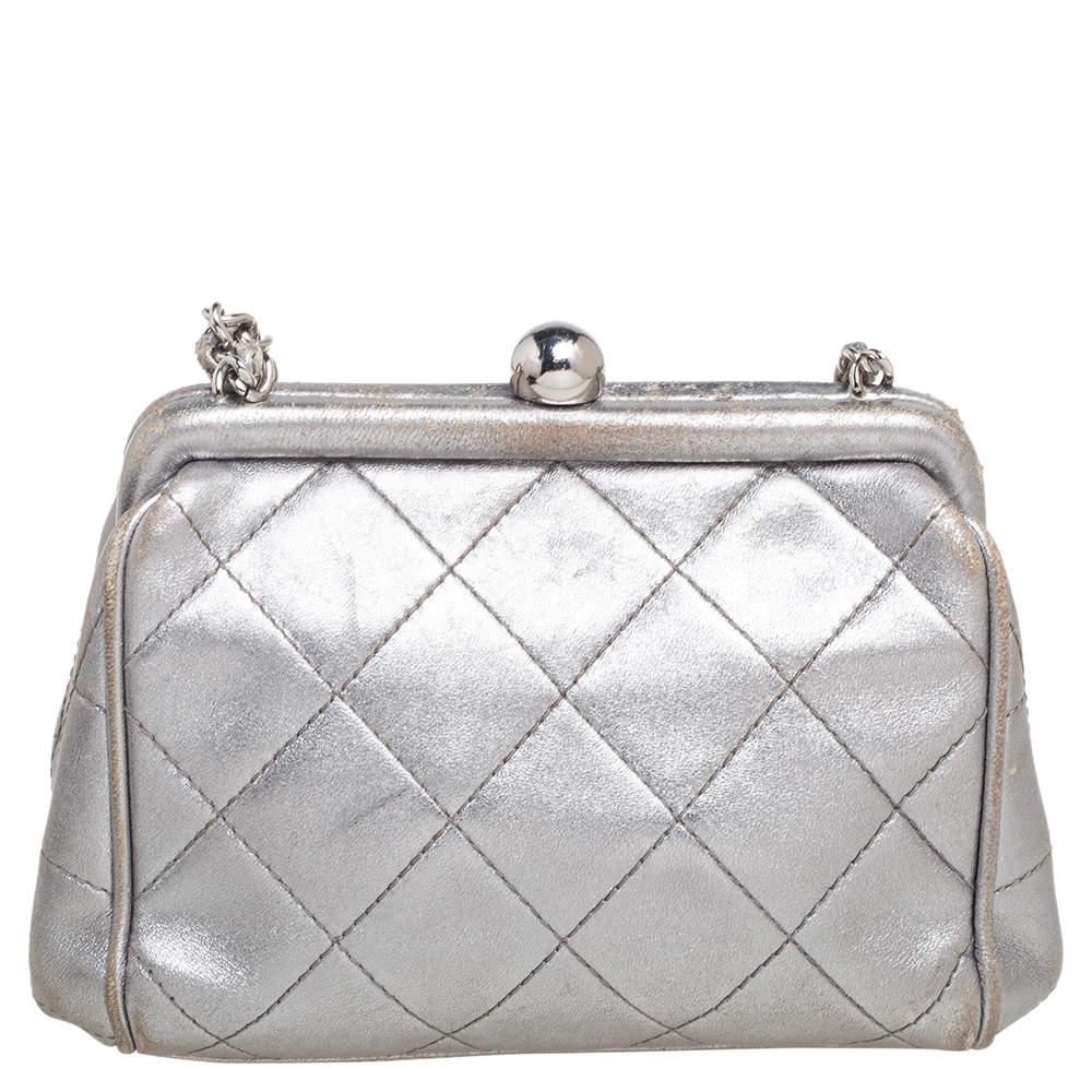 Beautifully crafted, this clutch bag by Chanel is a must-have for your party and evening style edit. Crafted from quilted leather, it is added with silver-tone hardware, a shoulder chain, and a leather-lined interior.

Includes: Original Dustbag
