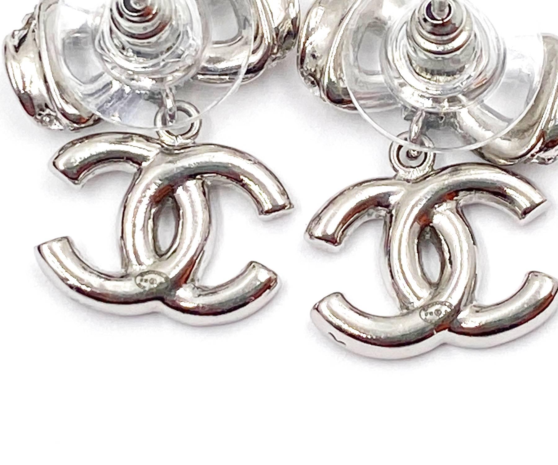 Artisan Chanel Silver Ribbon CC Dangle Crystal Piercing Earrings For Sale