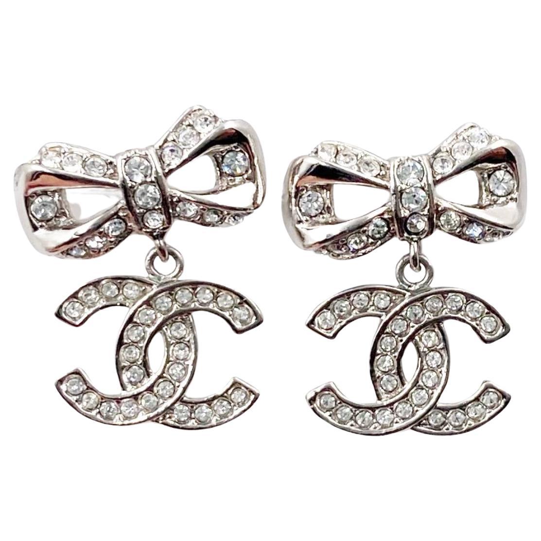 Chanel Silver Ribbon CC Dangle Crystal Piercing Earrings For Sale