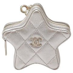 Chanel breloque étoile argentée