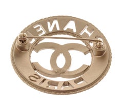 Chanel Silver-Tone Metal CC Paris Round Brooch
