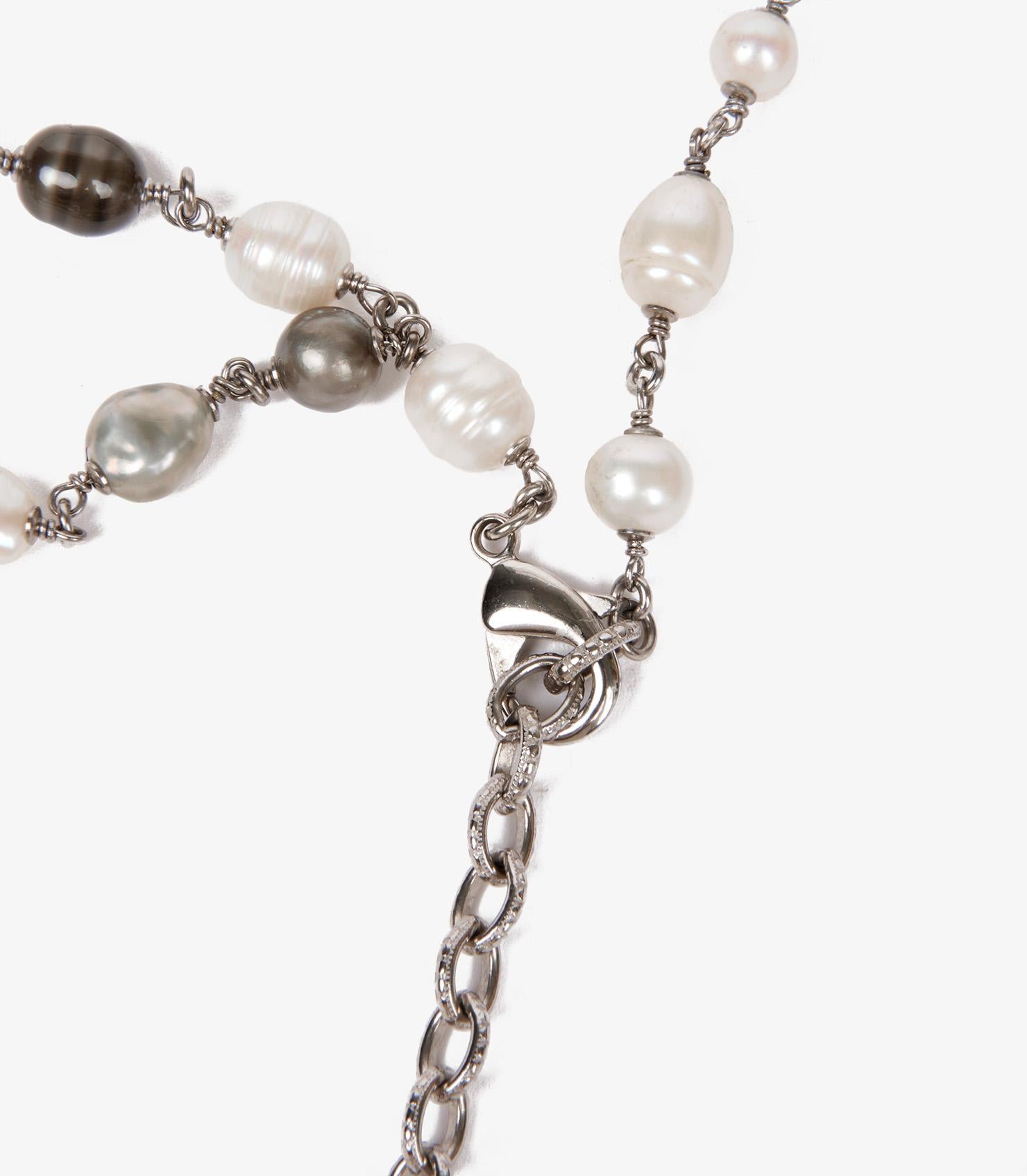 Chanel Silver Tone Metal Faux Pearl & Crystal Bow Chain Belt

Brand- Chanel
Model- Faux Pearl Belt
Product Type- Belt
Age- Circa 2010
Colour- Silver, White & Grey
Material(s)- Metal

Height- 6cm
Width- 92cm
Depth- 1cm
Closure- Lobster Clasp
Country