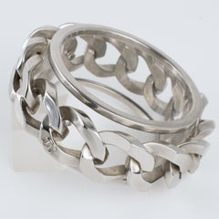 Bracciale Bangle di Chanel in metallo argentato e acrilico con design a catena pesante