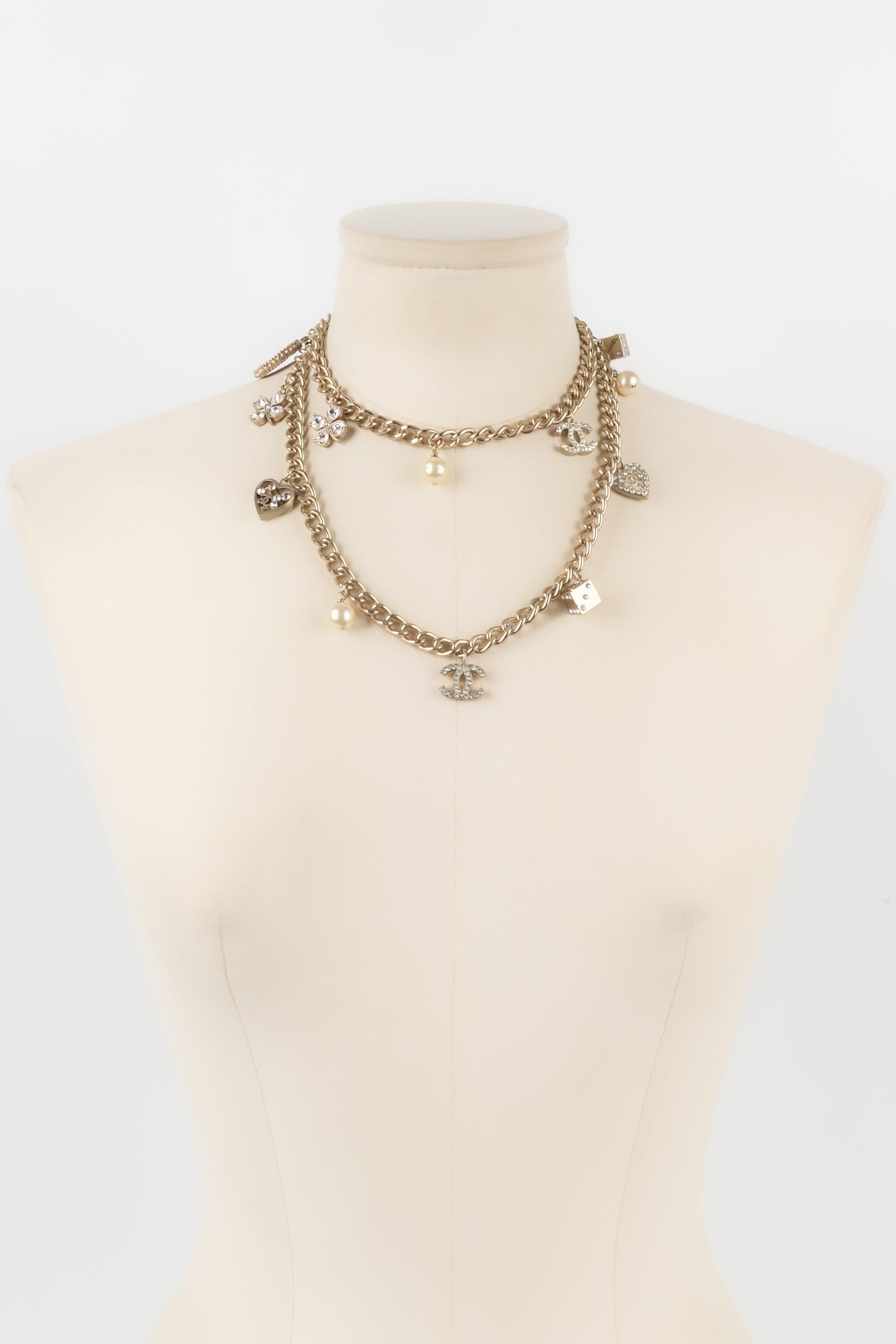 Women's Chanel Silvery Metal Necklace Ornamented with Charms and Rhinestones, Fall 2005 For Sale