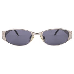 Gafas de sol Chanel de metal plateado con logotipos CC