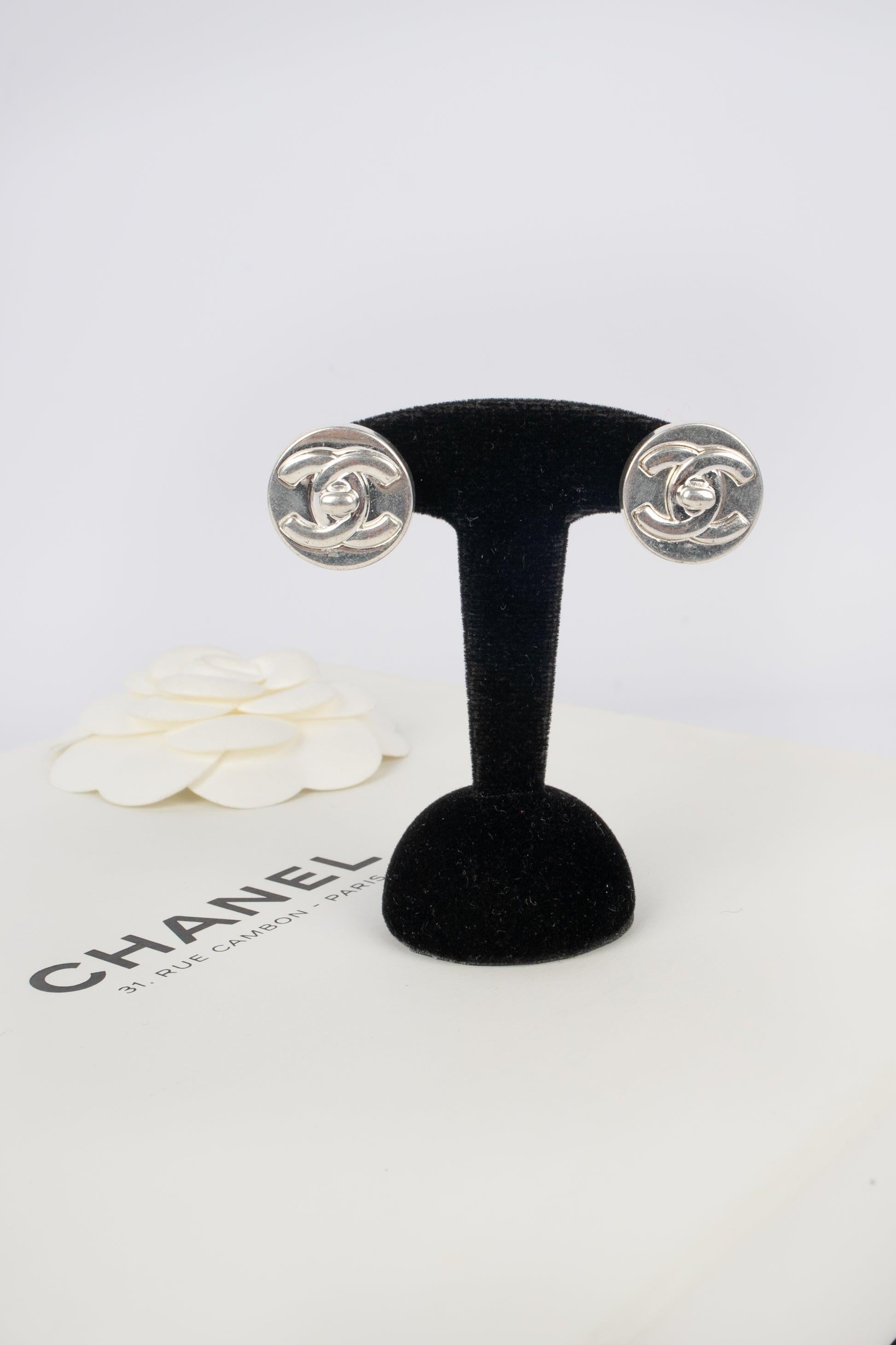 Chanel Silvery Metal Turnlock Circular Earrings, 1997 2