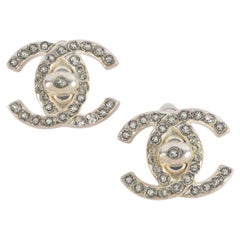 Chanel Silvery Metal Turnlock Clip-On Earrings with Rhinestones, 1996