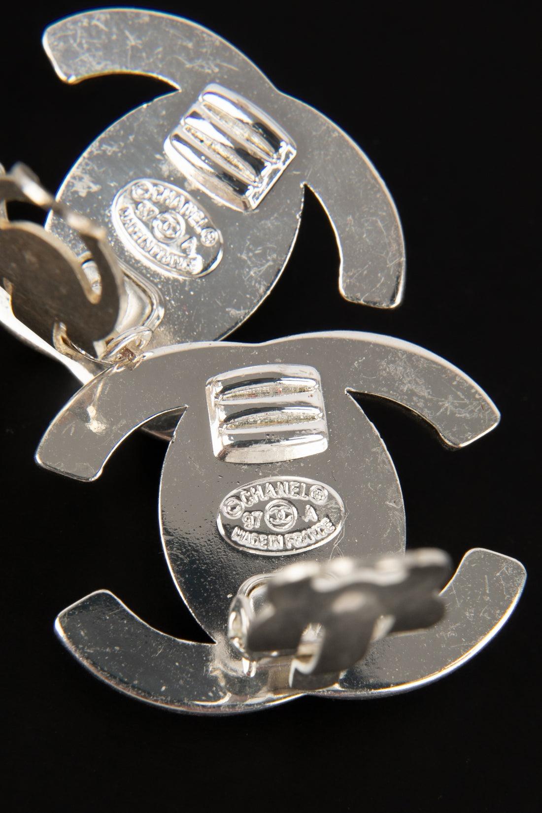 Women's Chanel Silvery Metal Turnlock Earrings, 1997