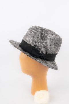 Chanel Silvery Tone Hat with a Black Ribbon