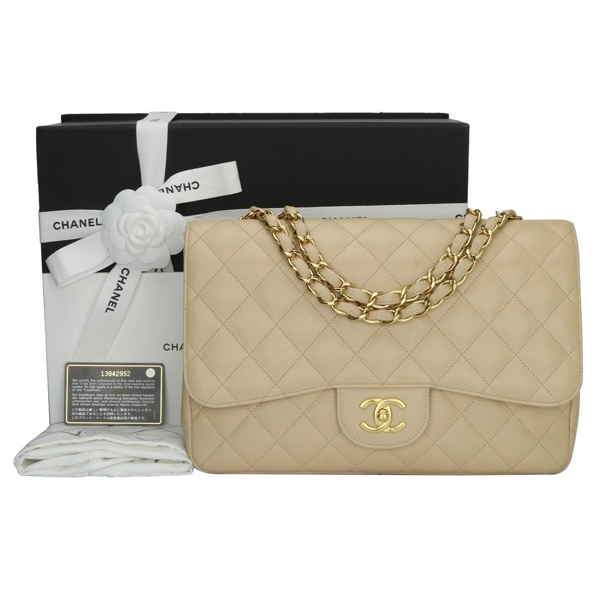 Authentic CHANEL Classic Single Flap Jumbo Bag Beige Clair Caviar with Gold Hardware 2009.

This stunning bag is in mint condition, the bag still holds the original shape and the hardware is still very shiny.

Exterior Condition: Mint condition,