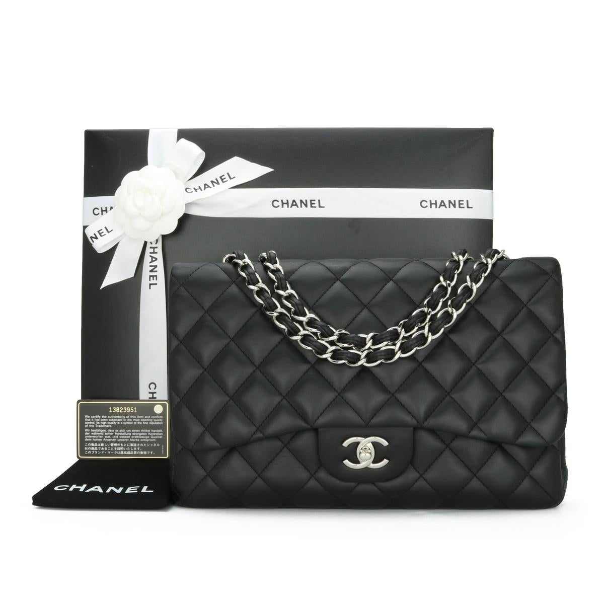 CHANEL Classic Single Flap Jumbo Bag in Black Lambskin with Silver-Tone Hardware 2010.

This stunning bag is in good condition, the bag still holds its shape well, and the hardware is still very shiny.

It is such a lightweight bag compared to