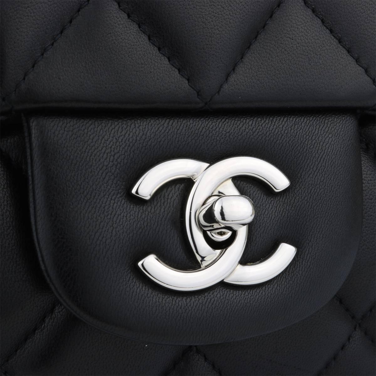 Authentic CHANEL Classic Single Flap Jumbo Black Lambskin with Silver Hardware 2009.

This stunning bag is in an excellent condition, the bag still holds the original shape and the hardware is still very shiny. Leather smells fresh as if