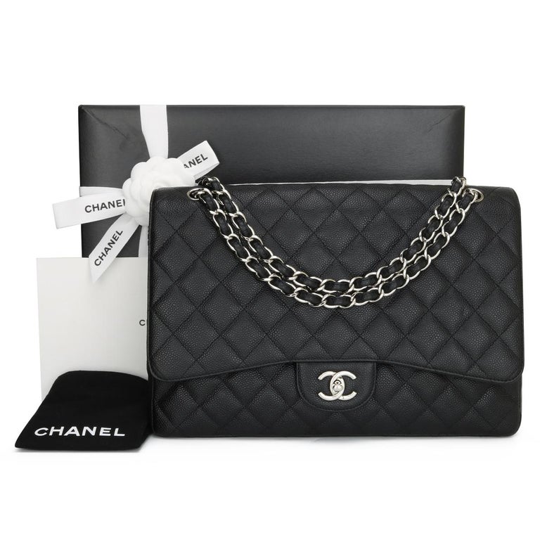 CHANEL Classic Single Flap Maxi Bag Black Caviar with Silver Hardware 2010.

This stunning bag is in pristine condition, the bag still holds its original shape, and the hardware is still very shiny.

- Exterior Condition: Pristine condition. Corners