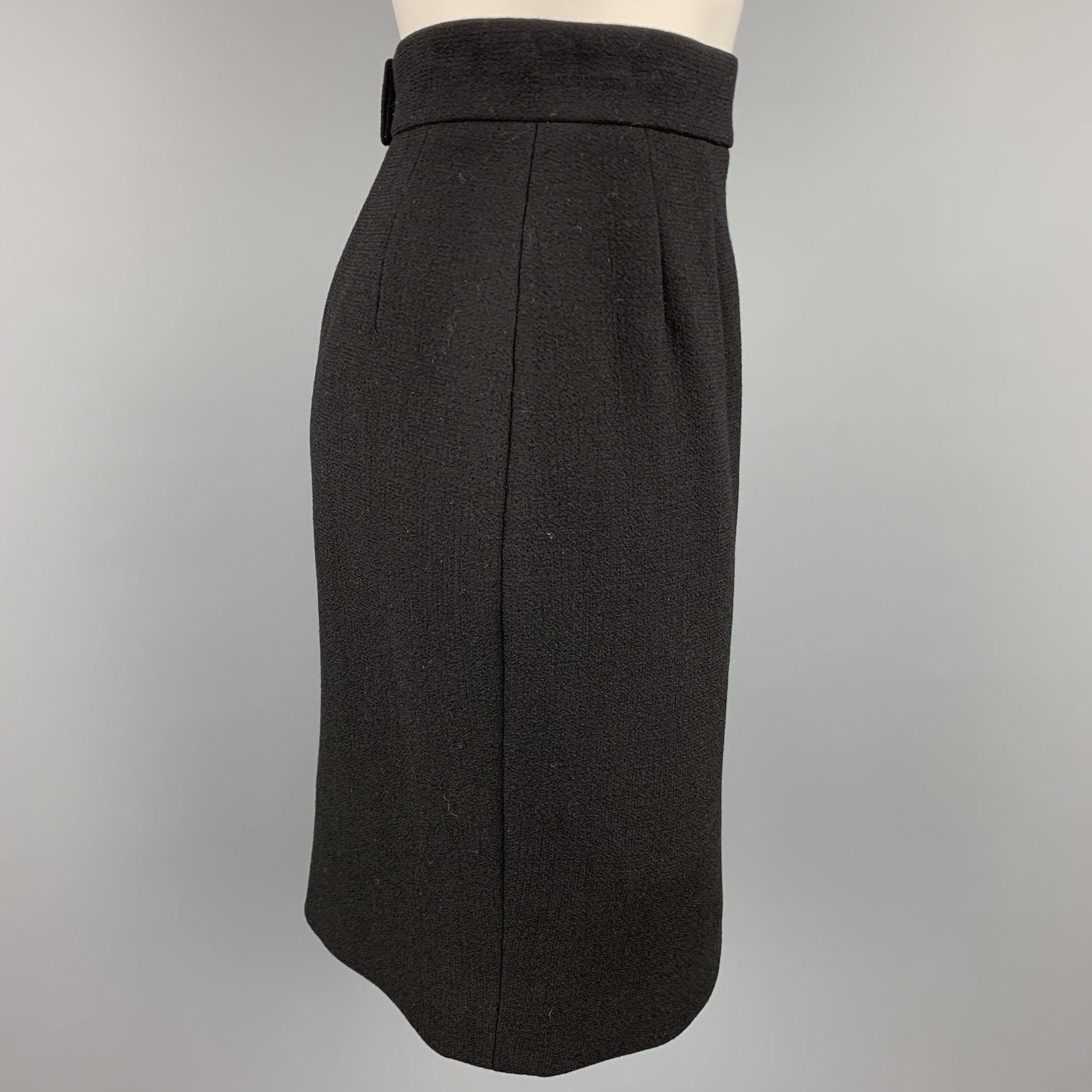 CHANEL skirt comes in a black crepe wool featuring a pleated pencil style, back zipper closure, and three back gold button details. Made in France.Very Good
Pre-Owned Condition. 

Marked:   42 

Measurements: 
  Waist: 28 inches 
Hip: 28 inches