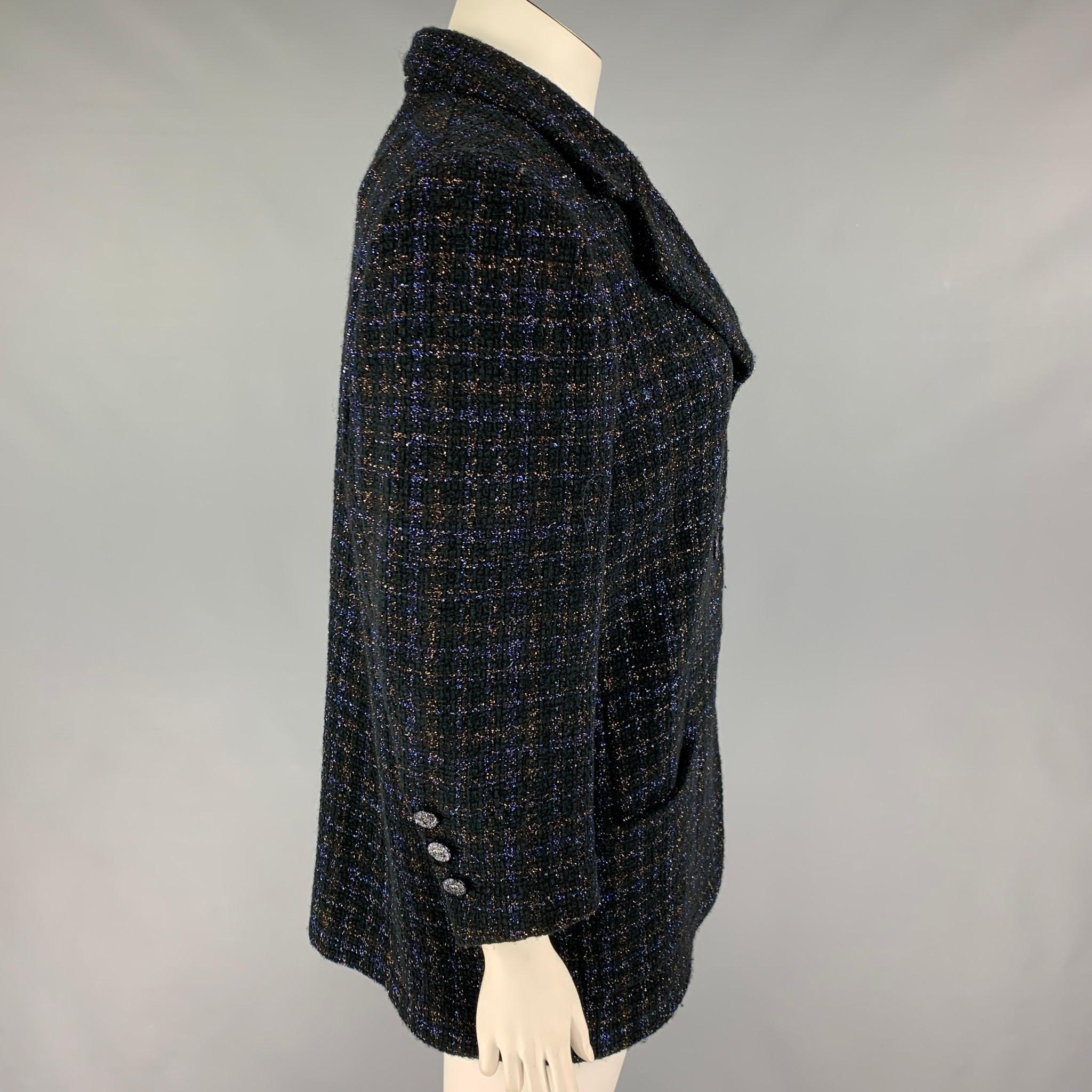 CHANEL coat comes in a navy & gold metallic boucle cotton blend with a full liner featuring a notch lapel, logo buttons, patch pockets, single back vent, and a three button closure. Made in France.

Excellent Pre-Owned Condition.
Marked: NF177 /