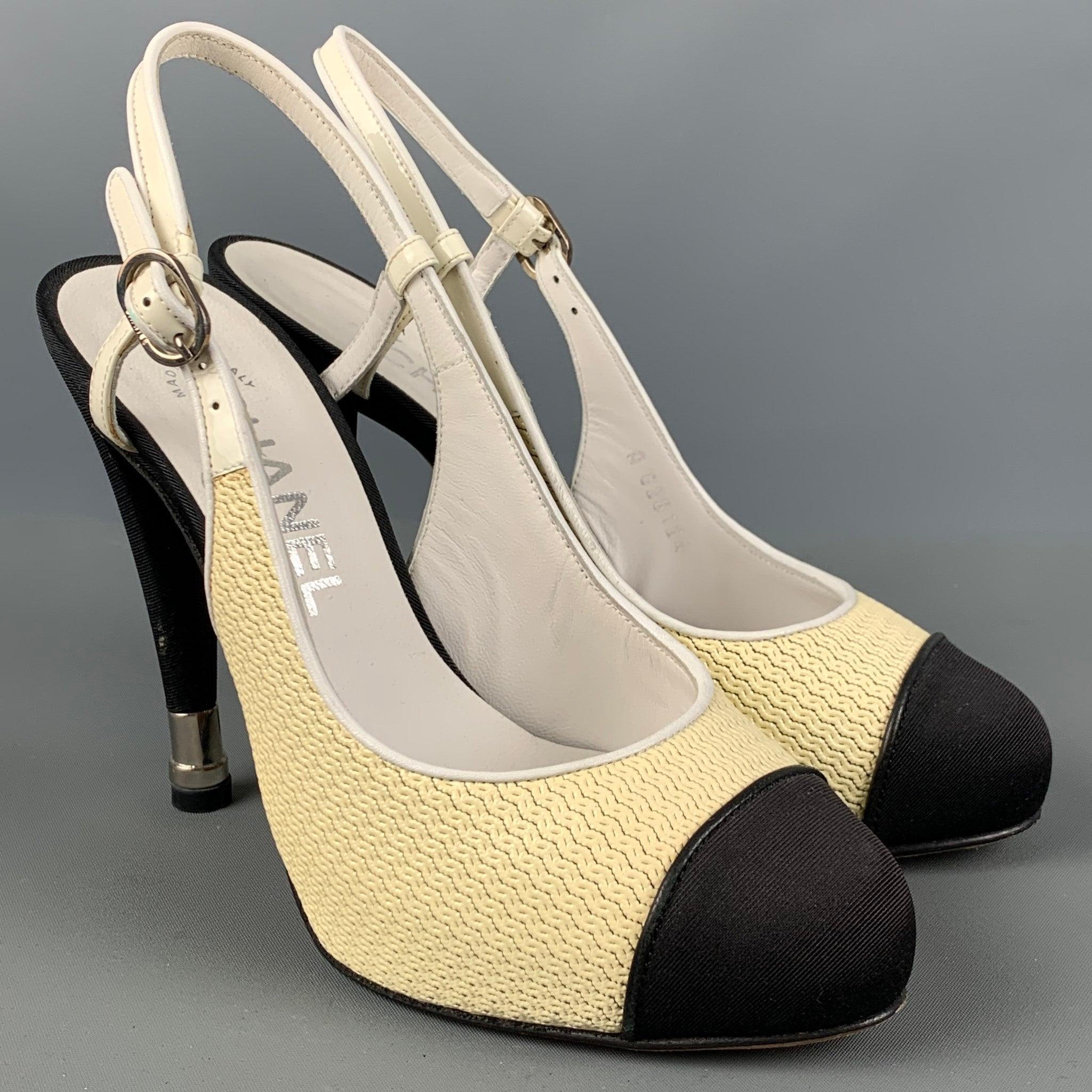 CHANEL pumps comes in a cream and black acetate ribbon material featuring a slingback, color block style, and a stiletto heel. Made in Italy.Very Good Pre-Owned Condition. 

Marked:   A G28124 

Measurements: 
  Heel: 4.5 inches  
  
  
 
Reference: