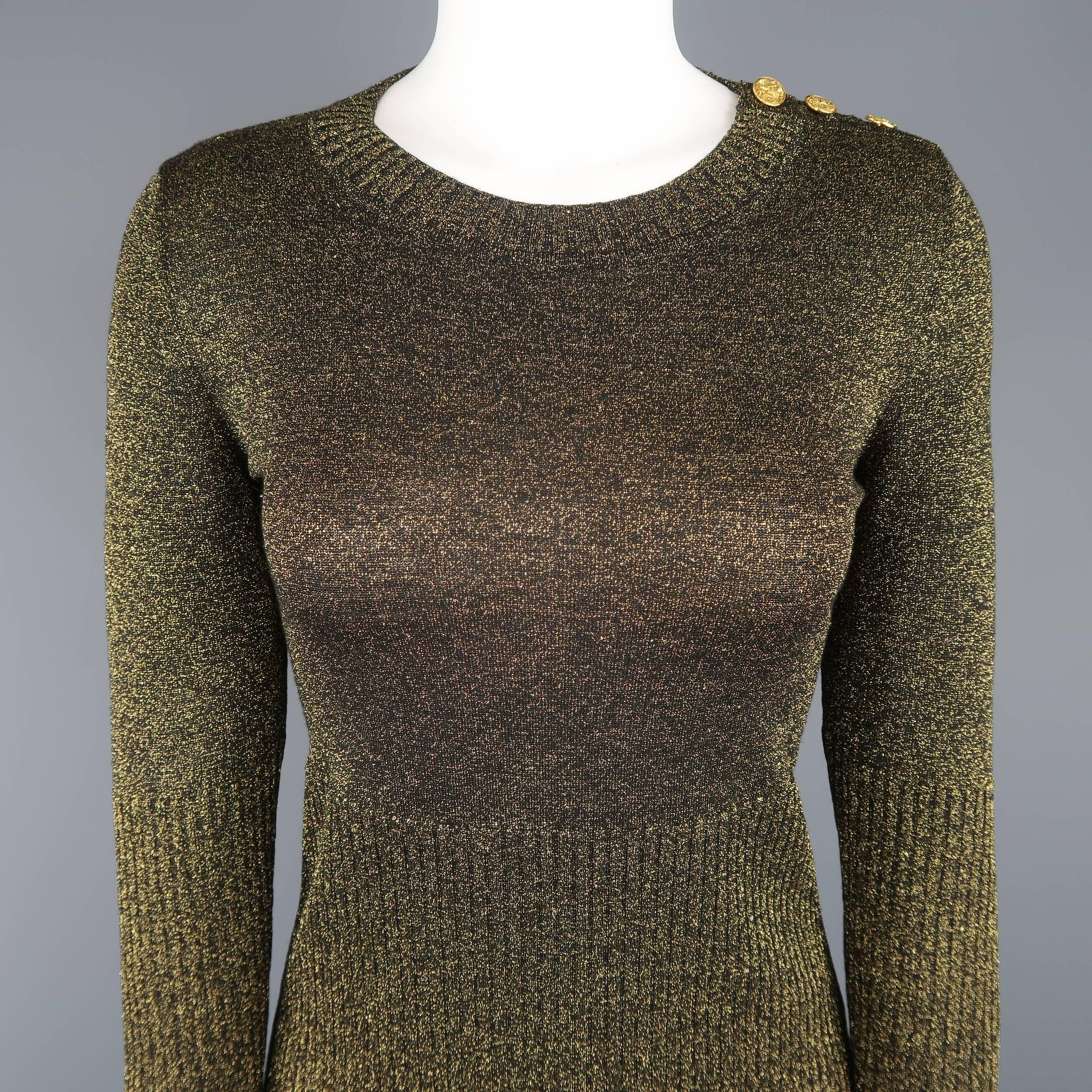 CHANEL sweater comes in a black and gold wool blend sparkle Lurex knit with a round neck, half ribbed body, and gold tone metal button shoulder. Made in Italy.
 
Excellent Pre-Owned Condition.
Marked: FR 38 (09A)
Measurements:
 
Shoulder: 14