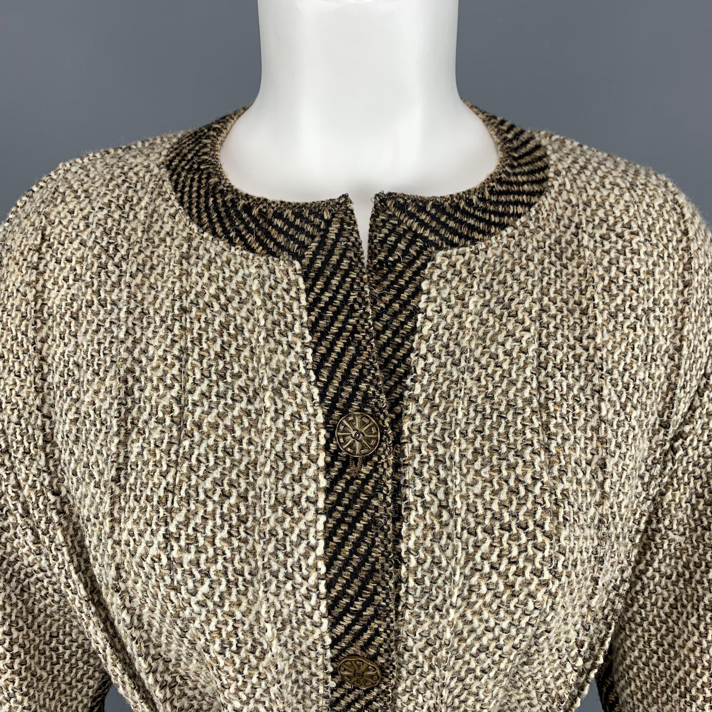 Archive CHANEL circa Fall Winter 1998 Collection cardigan jacket comes in beige wool nylon pleated fabric with a round, collarless neckline, thick black and brown contrast trim, antique dark gold tone CC buttons, and thick fabric tie waist with