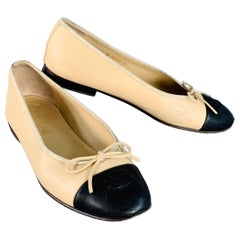 CHANEL Size 9 Beige Black Leather Monogram Cap Toe Flats