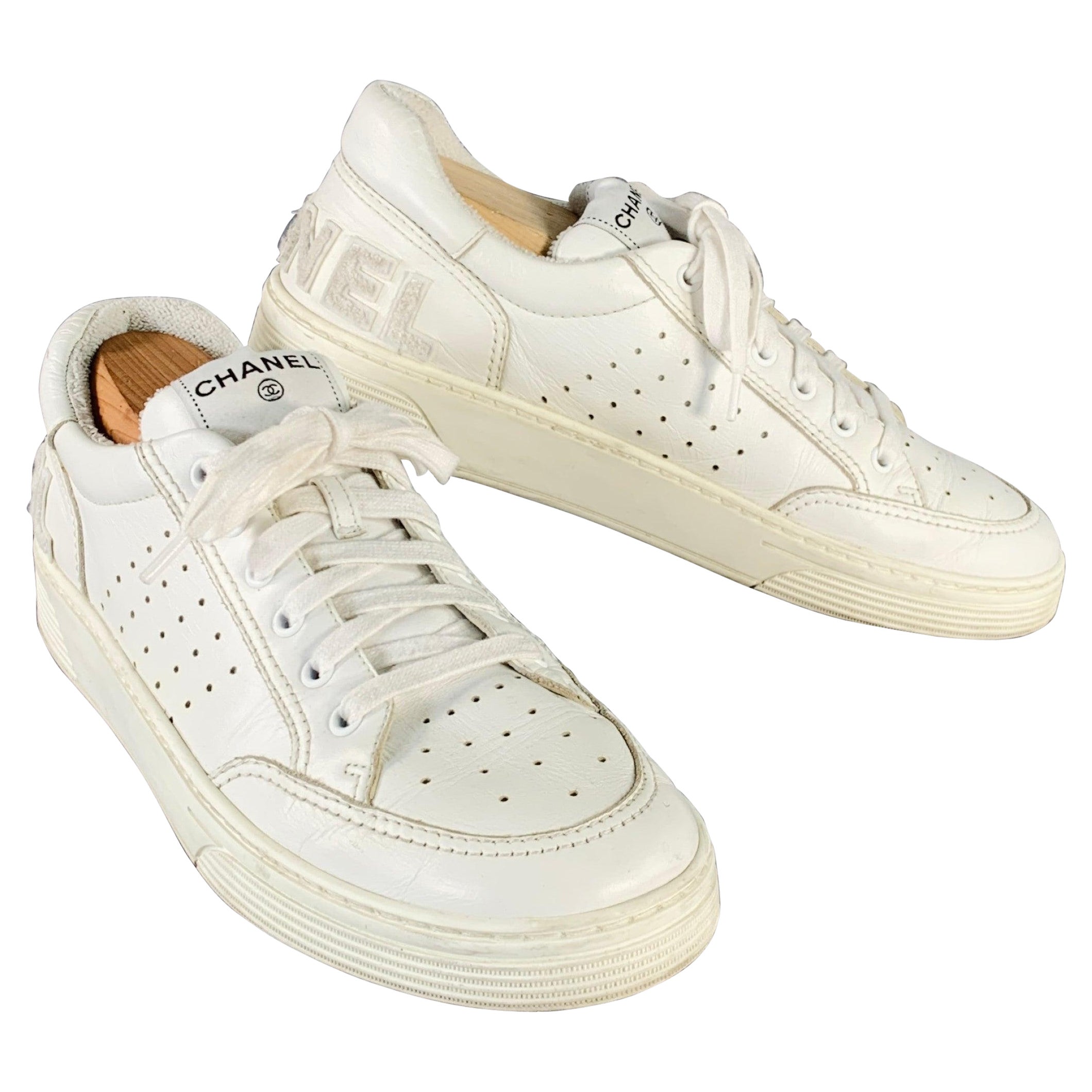 CHANEL Size 9 White Perforated Leather Logo Lace-Up Sneakers