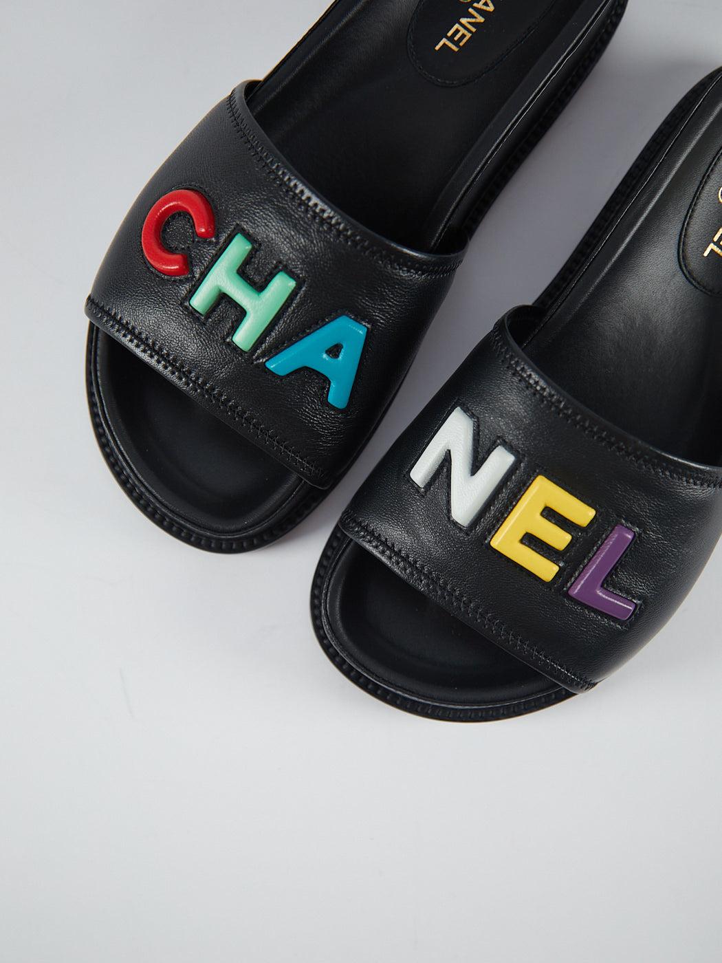 CHANEL SLIDE SANDALS Black with Multicolour Logo - Size 37 In Excellent Condition For Sale In London, GB