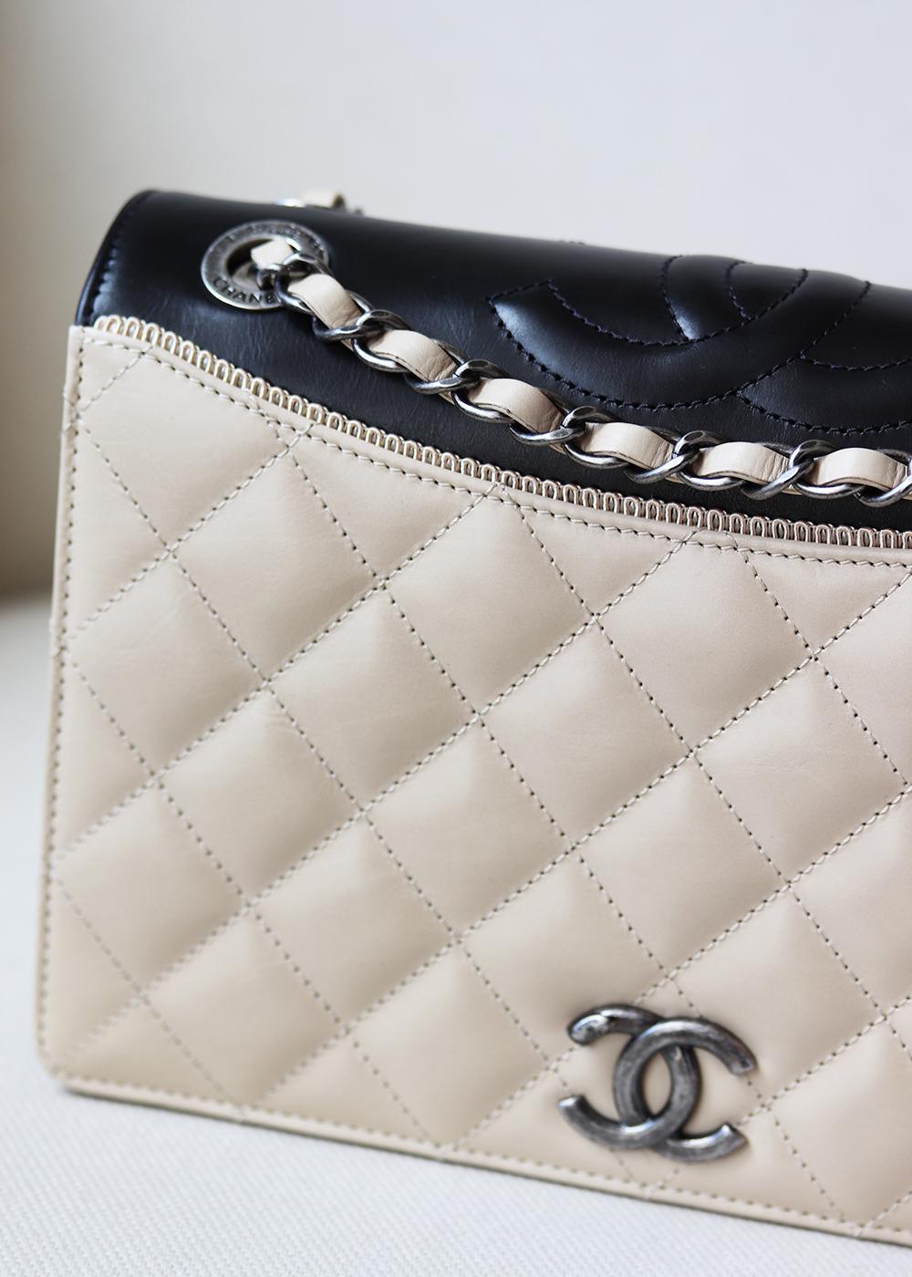 Chanel Small Ballerine Flap Bag has been hand-finished by skilled artisans in the label's workshop.
Boasting a soft lambskin-leather exterior with satin edging, this design is accented with silver-toned and beige lambskin-leather chain strap.
Made