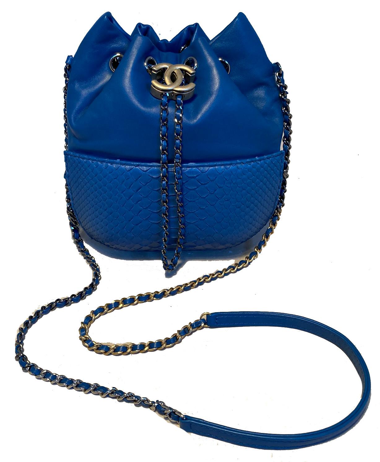 Chanel Small Blue Leather and Python Gabrielle Bucket Bag in excellent condition. Beautiful limited edition blue leather and python exterior. Soft lambskin leather top with structured python leather bottom trimmed with matte gold hardware. Small