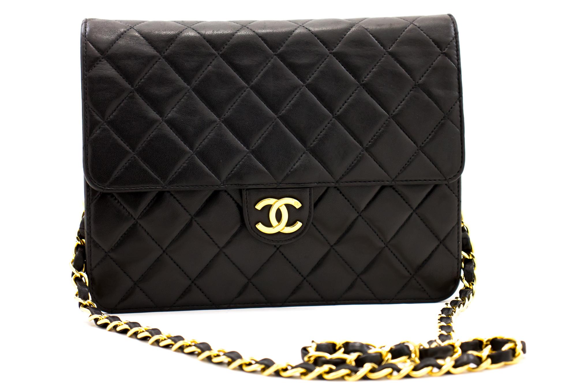 An authentic CHANEL Small Chain Shoulder Bag Clutch Black Quilted Flap made of black Lambskin. The color is Black. The outside material is Leather. The pattern is Solid. This item is Contemporary. The year of manufacture would be 1986.
Conditions &