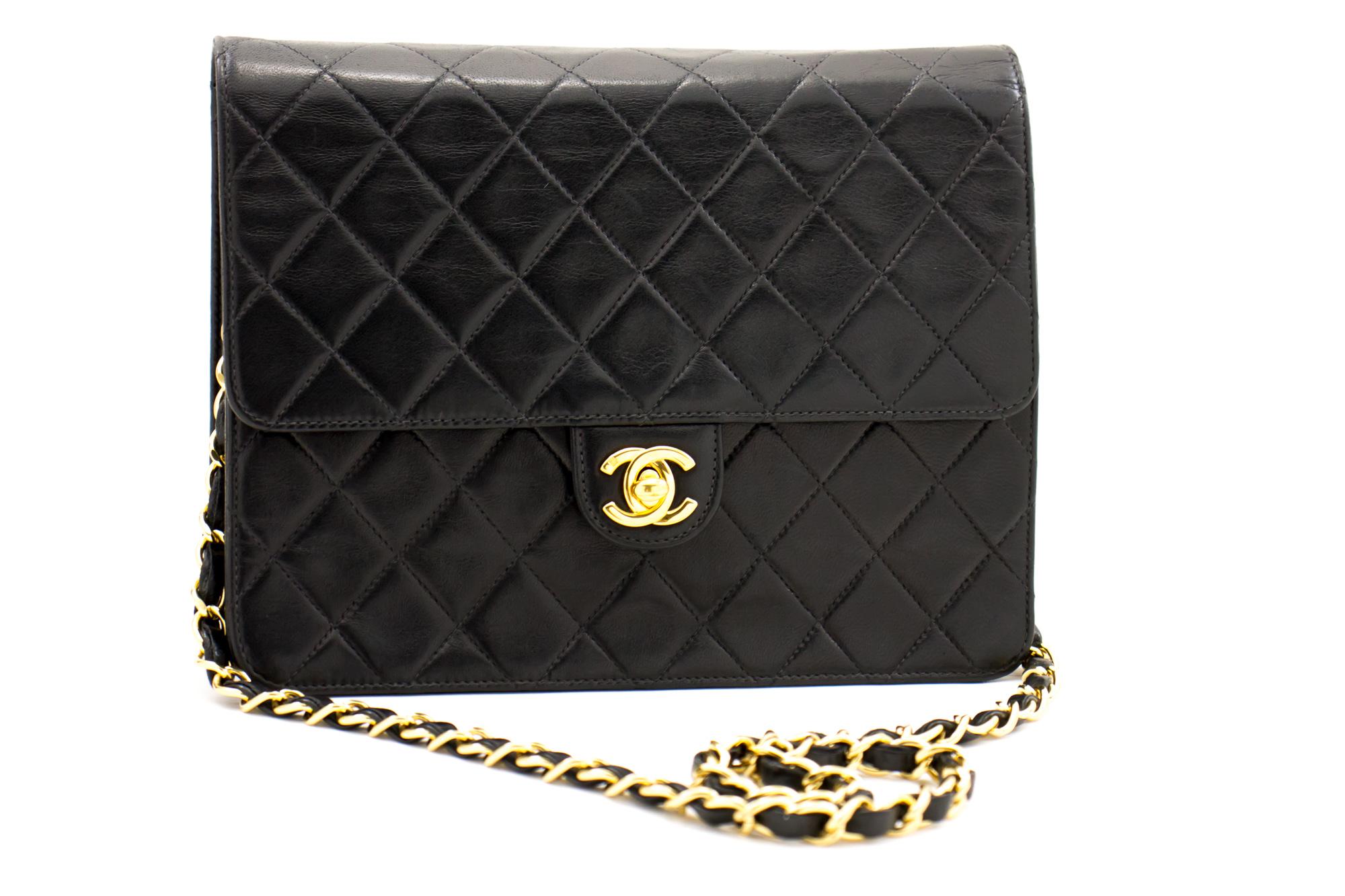 An authentic CHANEL Small Chain Shoulder Bag Clutch Black Quilted Flap made of black Lambskin. The color is Black. The outside material is Leather. The pattern is Solid. This item is Contemporary. The year of manufacture would be 2000-2 0 0 2