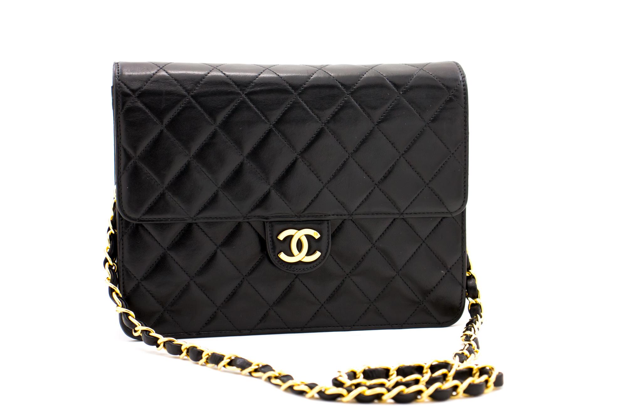 An authentic CHANEL Small Chain Shoulder Bag Clutch Black Quilted Flap made of black Lambskin. The color is Black. The outside material is Leather. The pattern is Solid. This item is Contemporary. The year of manufacture would be 2012.
Conditions &