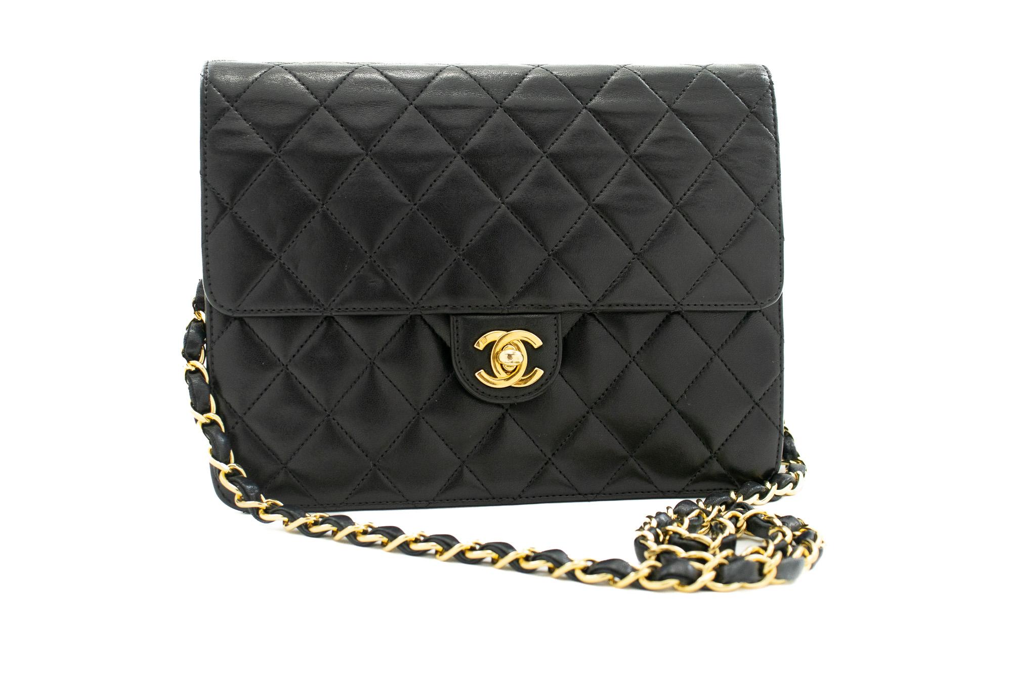An authentic CHANEL Small Chain Shoulder Bag Black Quilted Flap made of black Lambskin Purse. The color is Black. The outside material is Leather. The pattern is Solid. This item is Contemporary. The year of manufacture would be 2003.
Conditions &