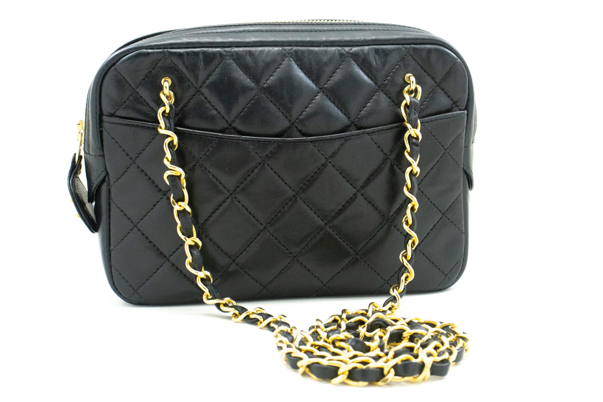 An authentic CHANEL Small Chain Shoulder Bag Black made of black Lambskin Leather Zipper. The color is Black. The outside material is Leather. The pattern is Solid. This item is Vintage / Classic. The year of manufacture would be