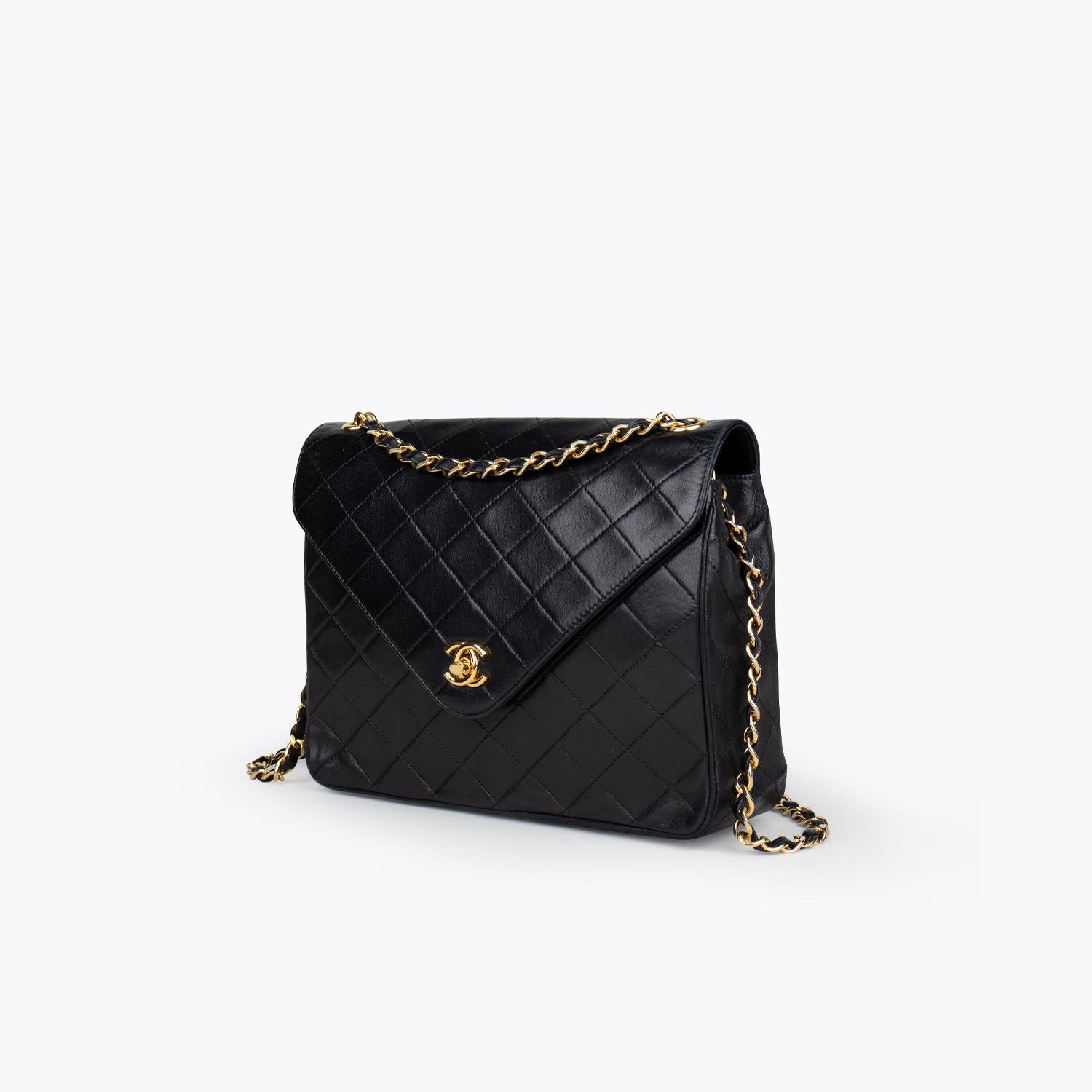 Black quilted leather vintage Chanel Small Classic Single Flap bag with

- Gold-hardware
- Single convertible chain-link and leather shoulder strap
- Burgundy leather lining, single zip pocket at interior wall, and interlocking 'CC' turn-lock