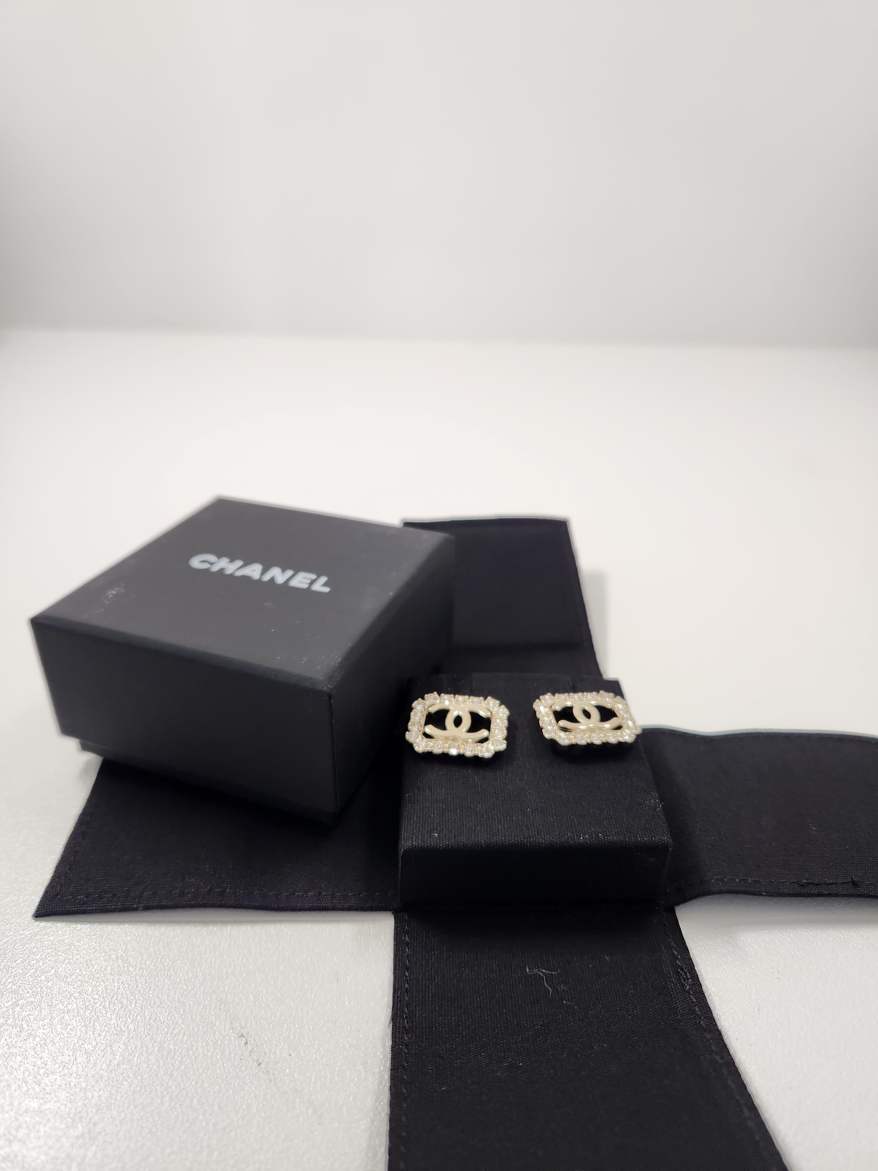 Elevate your elegance with the Chanel Small Rhinestone CC Rectangular Stud Earrings B23.

These exquisite earrings from Chanel's timeless collection feature a refined rectangular design adorned with sparkling rhinestones, offering a perfect balance