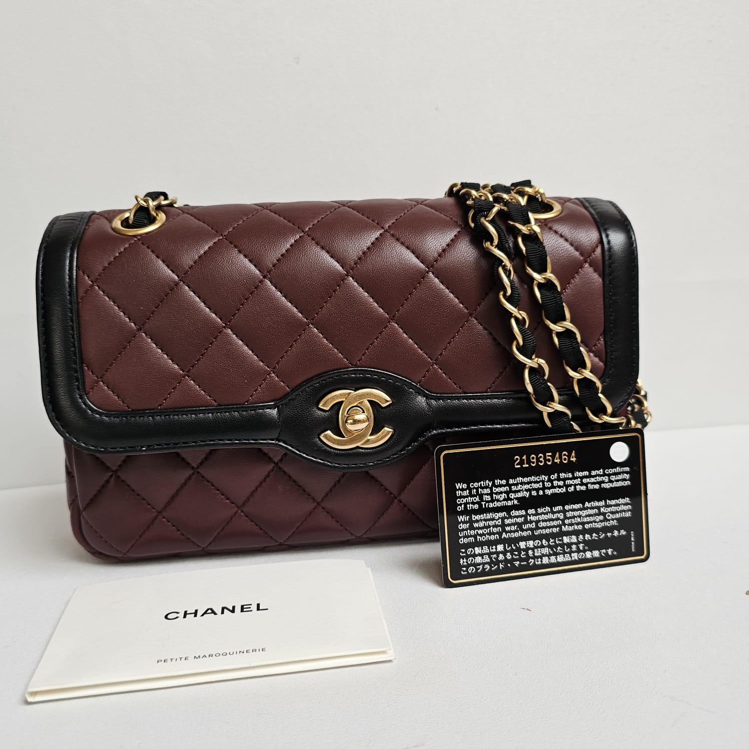 Women's or Men's Chanel Small Two Tone Burgundy Black Lambskin Quilted Flap Bag For Sale