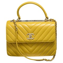 Chanel - Petit sac à rabat jaune tendance CC