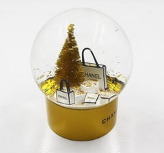 Chanel Snow Globe with Christmas Tree and Shopping Bag operates with Battery