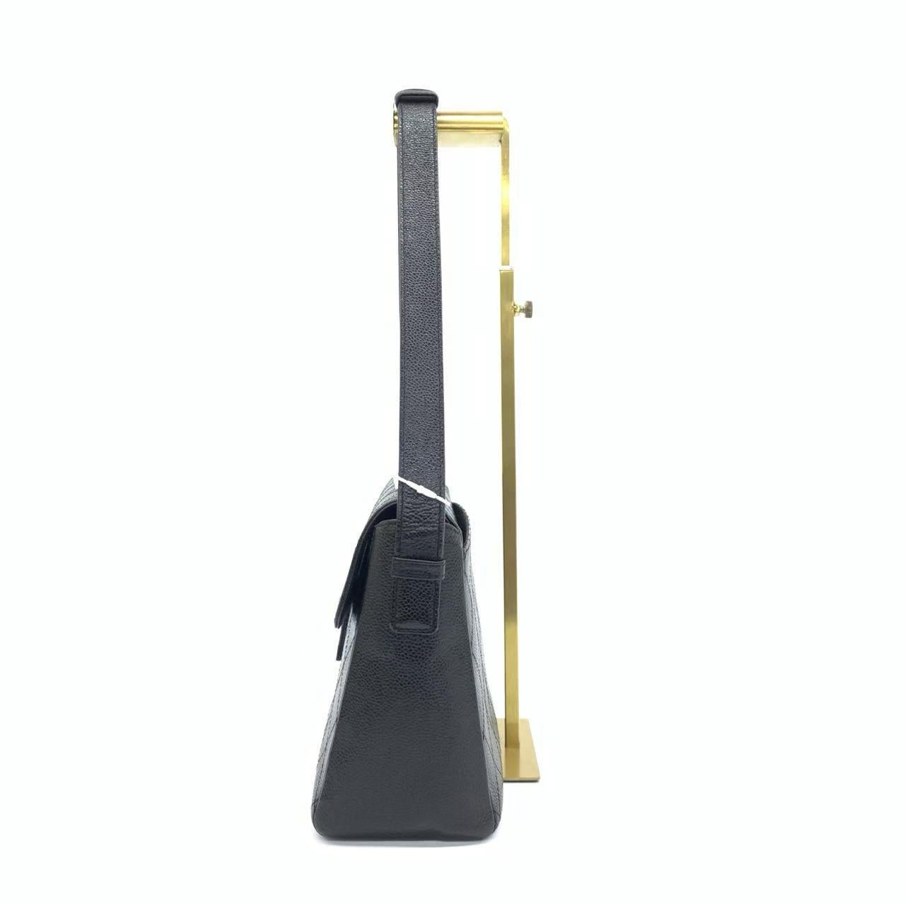 Chanel So Black Caviar Shoulder Bag Front Buckle Adjustable Strap
 These are professional photos of the actual bag.
 Add a touch of brightness to your summer wardrobe with this classic flap from Chanel, featuring a cheerful pastel with its misty