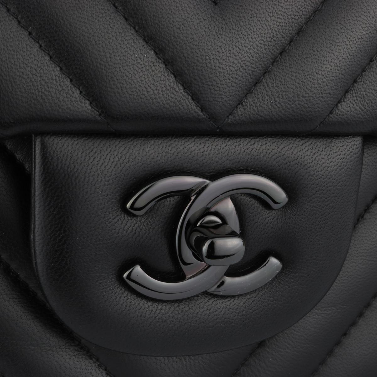 Authentic CHANEL So Black Chevron Classic Double Flap Jumbo Bag Black Lambskin with Black Hardware 2015 Limited Edition.

This stunning bag is in mint condition, the bag still holds its original shape, and the hardware is still very shiny.

Exterior