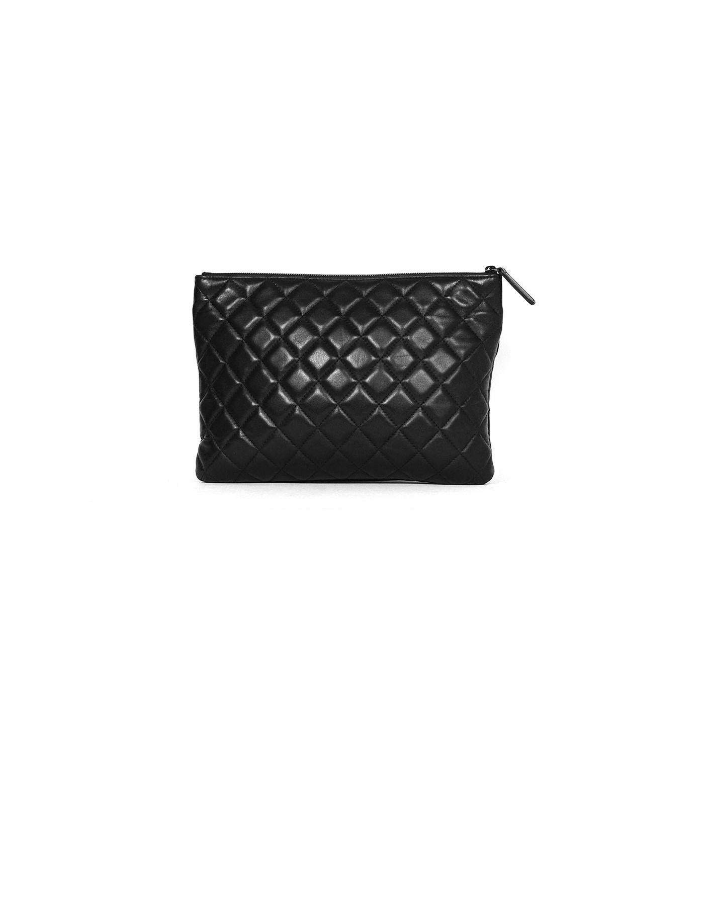 Chanel SO Black Lambskin Quilted Pouch/Clutch Bag

Made In: Italy
Year of Production: 2018
Color: Black 
Hardware: Black
Materials: Lambskin leather
Lining: Black grosgrain
Closure/Opening: Zip top and flap front compartment
Exterior Pockets: One