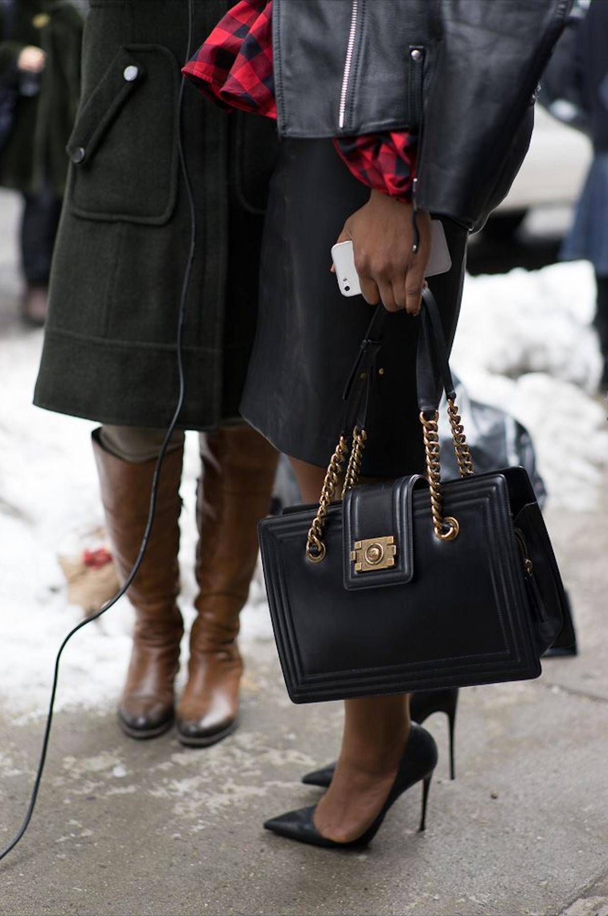 Chanel Limited Edition Medium Boy Classic Grand Shopping Tote Travel Bag 

Year: 2011

Aged gold-tone hardware
Black glazed calfskin leather
Chain-link straps with leather pads
Boy push-lock closure
Black nylon interior
Two main interior