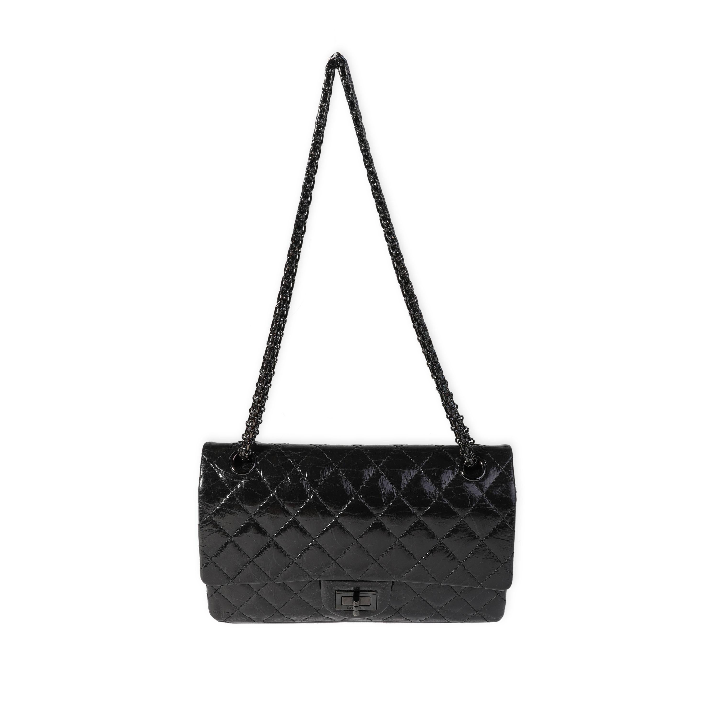 Listing Title: Chanel So Black Patent Crinkled Calfskin Reissue 2.55 225 Double Flap Bag
SKU: 121591
MSRP: 8800.00
Condition: Pre-owned 
Handbag Condition: Excellent
Condition Comments: Excellent Condition. Plastic to some hardware. Light scuffing