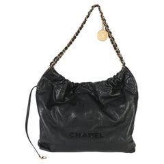 Chanel So Black Quilted Caviar Chanel 22 Hobo Handbag