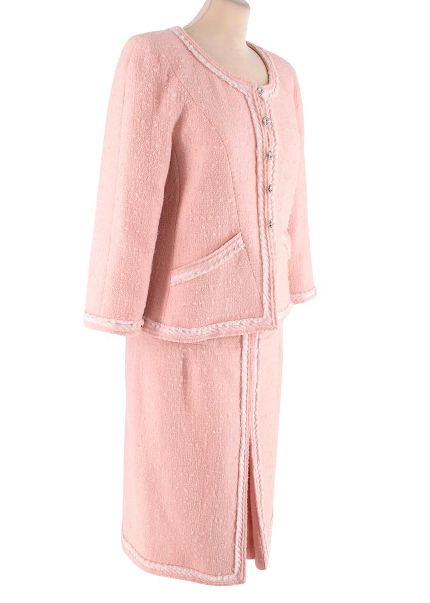 Chanel Soft Pink Boucle Collarless Jacket & Pencil Skirt Suit Set

- Iconic Chanel design rendered in soft, feminine soft pink tones
- Collarless jacket edged with two tones of raw edged pink cloth, the lightest tone of which features the signature