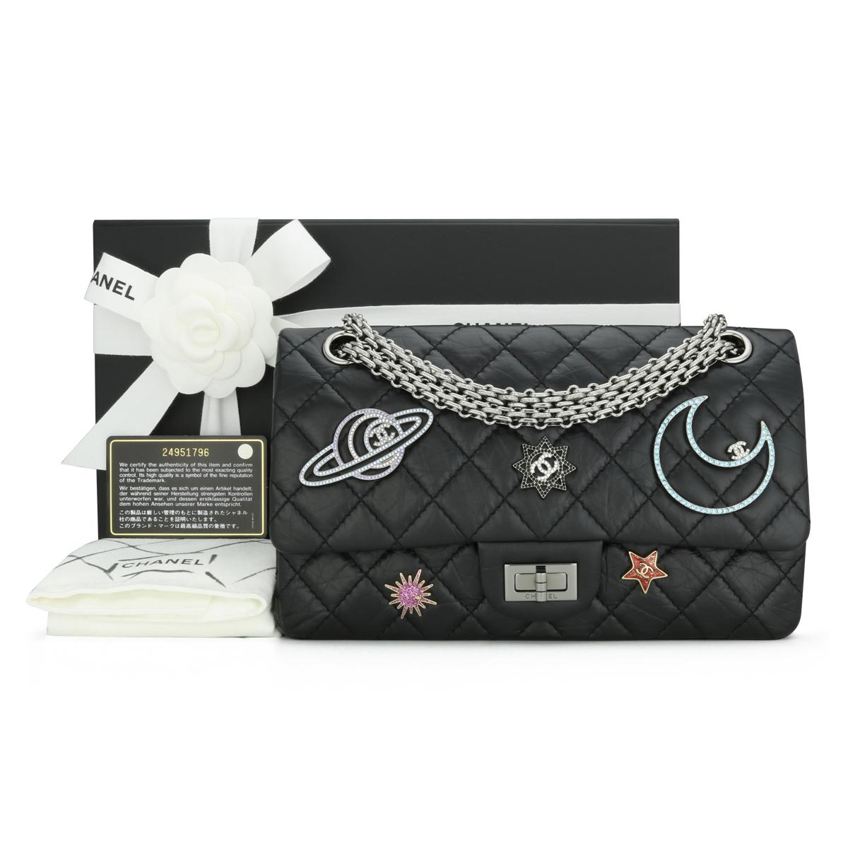 CHANEL Space Charms 2.55 Reissue 225 Quilted Flap Bag in Black Aged Calfskin with Gunmetal Hardware 2017 – 17K.

This stunning bag is in immaculate condition; it still holds its original shape, and the hardware is still very shiny.

This elegant