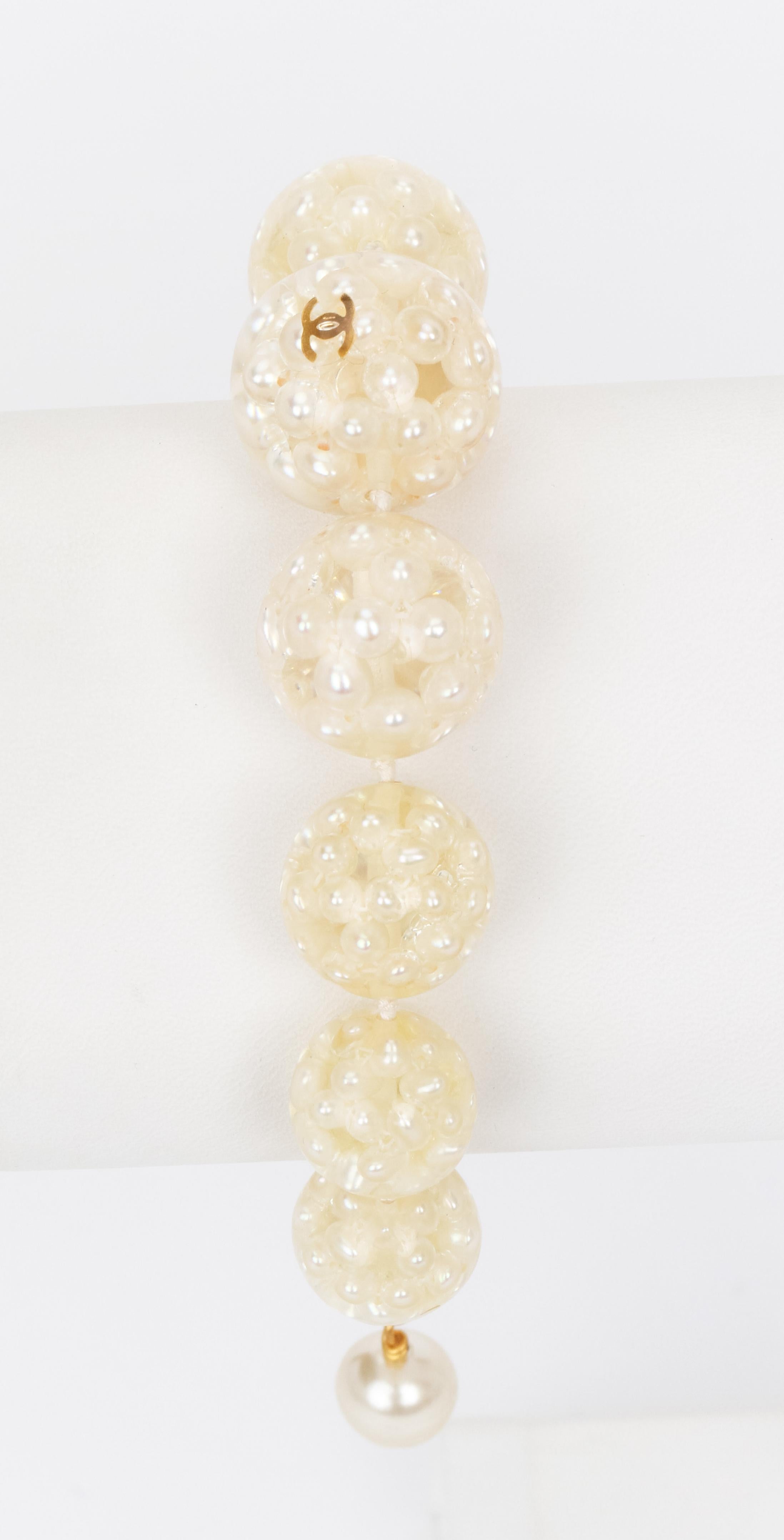 Chanel bracelet with nine spheres, each filled with micro pearls. adjustable length