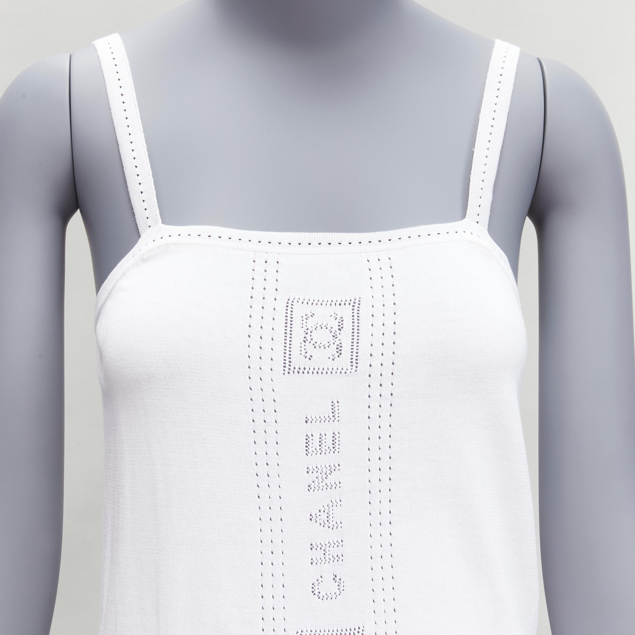 CHANEL SPORT 07C white cotton CC interlock logo knit cami tank top FR36 S
Reference: TGAS/D00114
Brand: Chanel
Designer: Karl Lagerfeld
Collection: Sports Line Cruise 2007
Material: Cotton
Color: White
Pattern: Solid
Closure: Slip On
Made in: